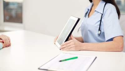 doctor going over Spine Surgery with patient in Miami